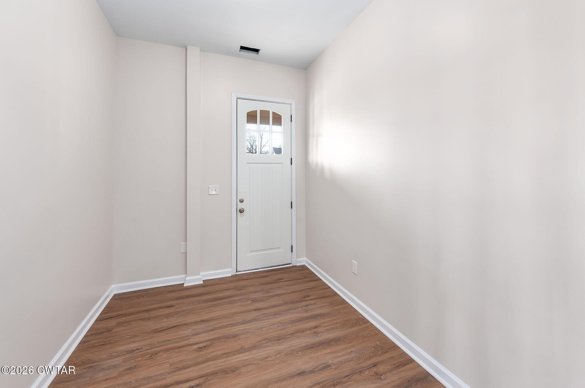 200 Lambuth Boulevard Jackson, TN 38301 - Photo 9 of 28 a view of an empty room with wooden floor