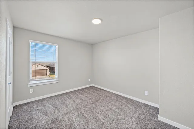 an empty room with a window