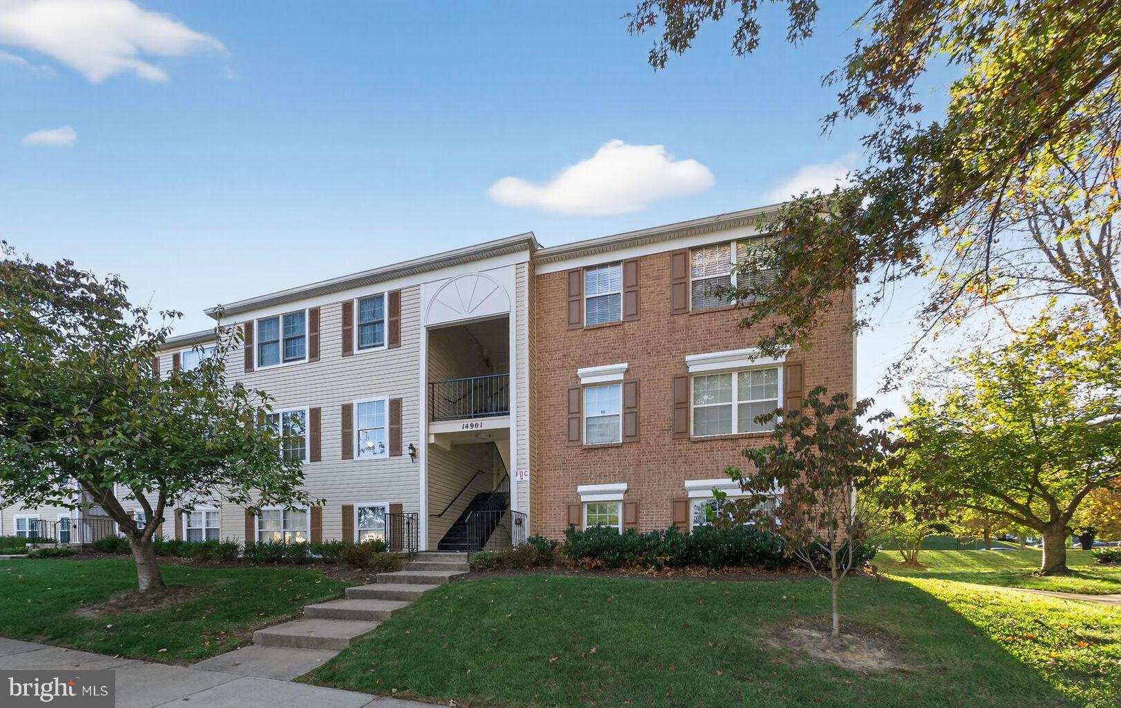 14901 McKisson Court, Unit 7CC Silver Spring, MD 20906 - Photo 1 of 34 a view of a building with a yard