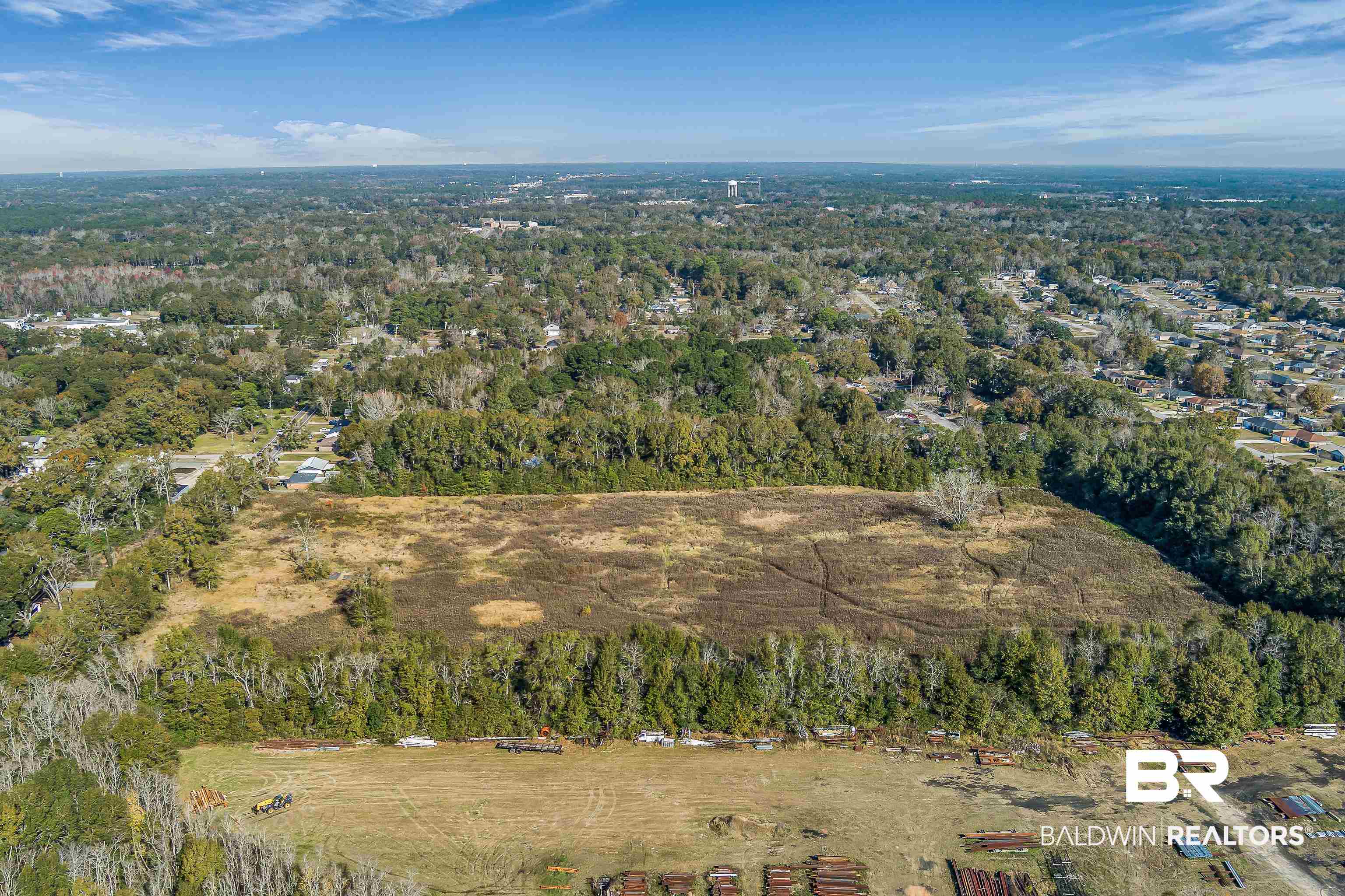 7787 Bellingrath Road Theodore, AL 36582 - Photo 33 of 36 View of property location with a heavily wooded area