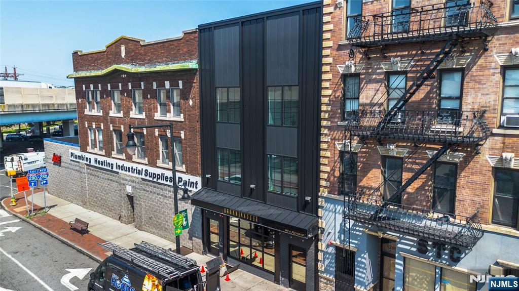 a city street filled with lots of tall buildings