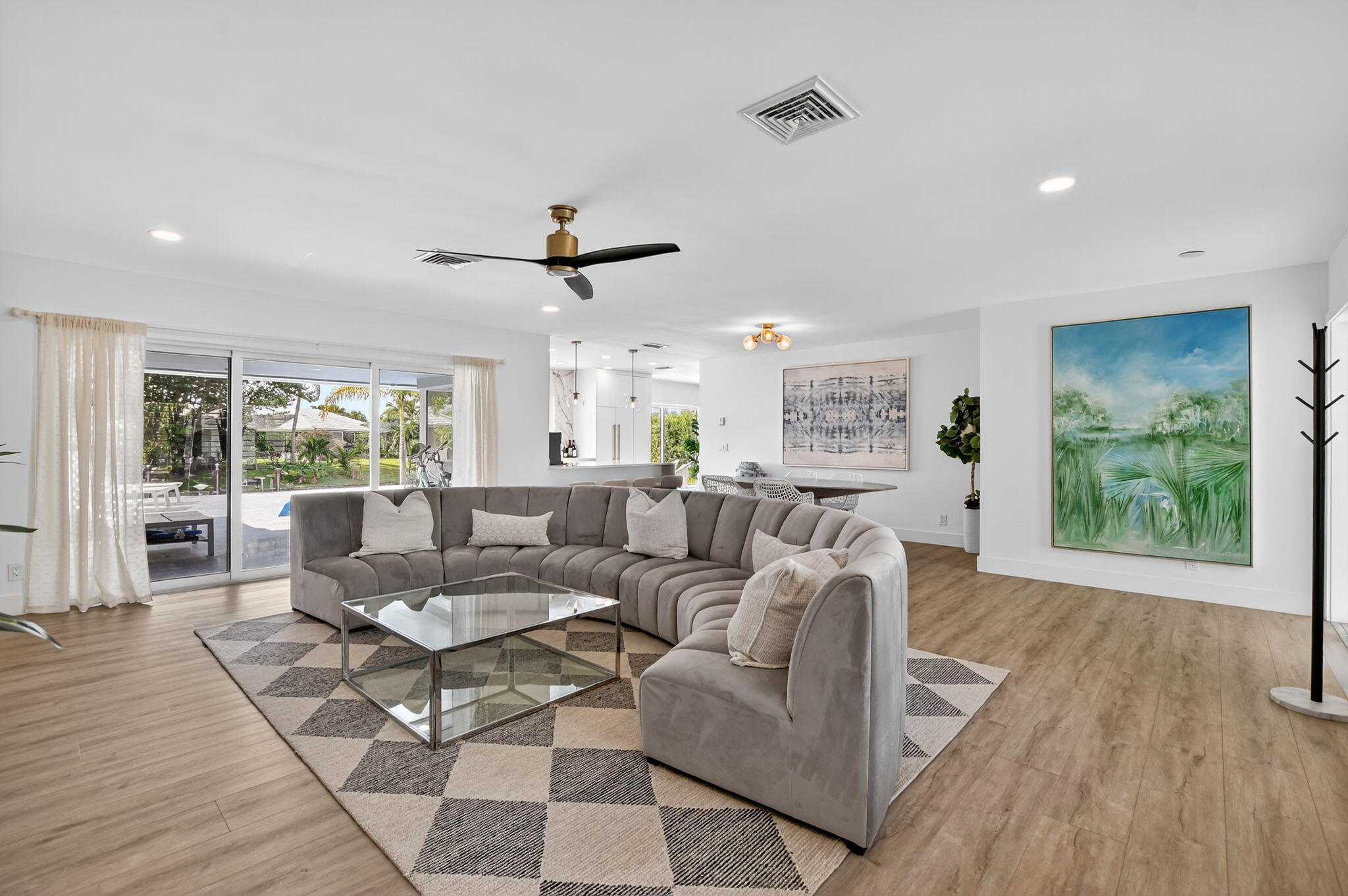 891 Hickory Terrace Boca Raton, FL 33486 - Photo 17 of 56 a living room with furniture and a large window