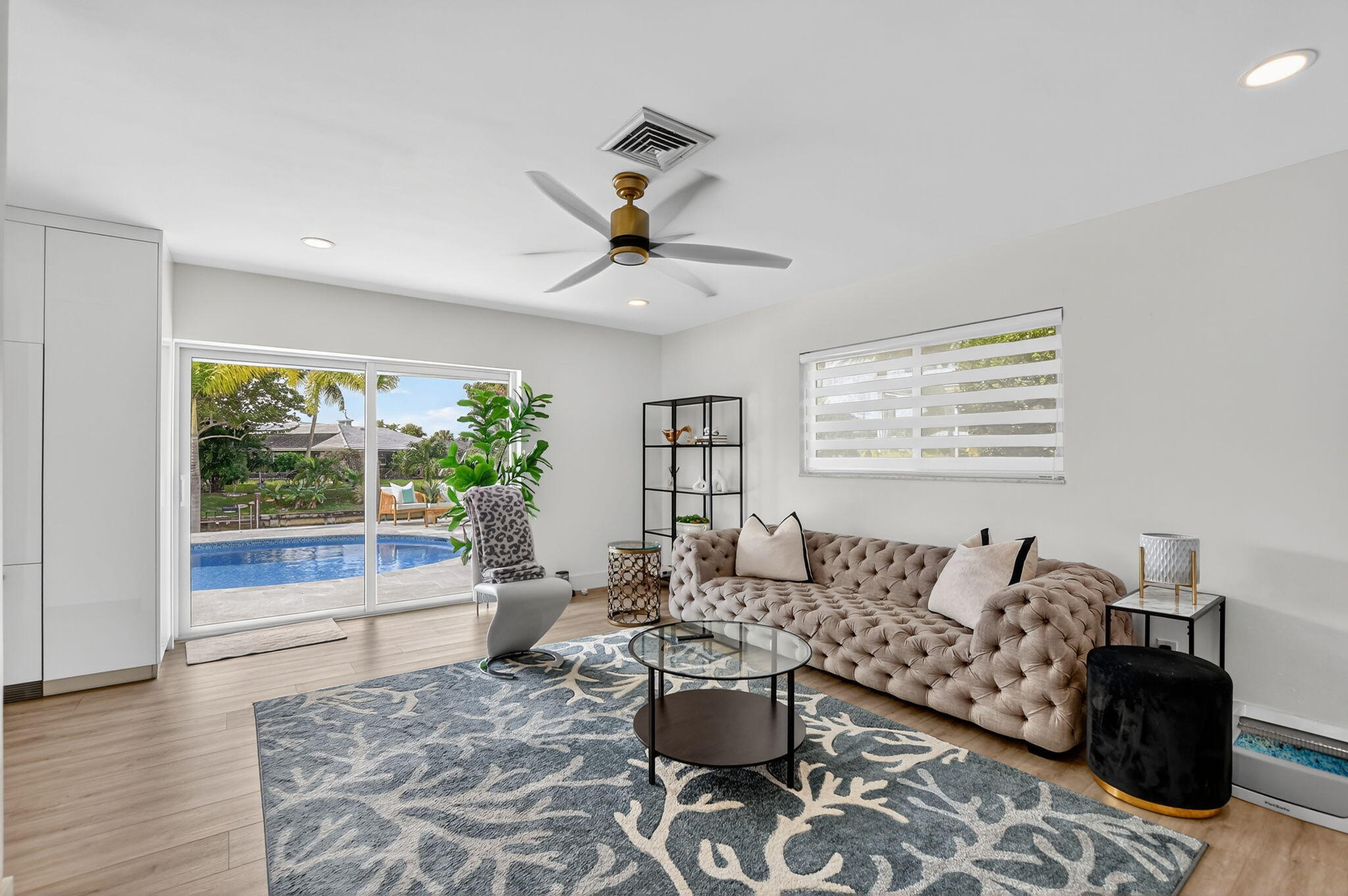 891 Hickory Terrace Boca Raton, FL 33486 - Photo 20 of 56 a living room with furniture and a window