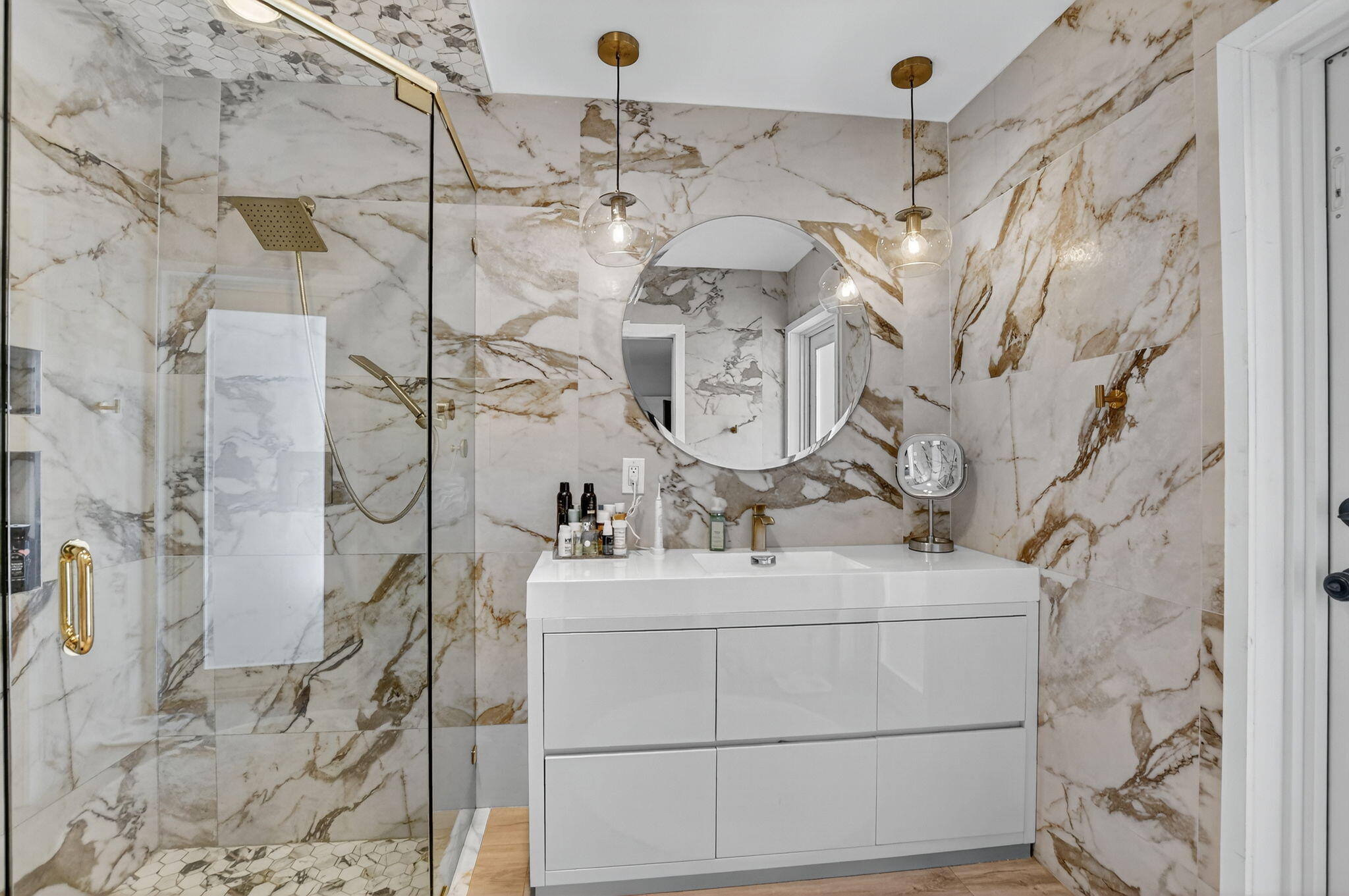 891 Hickory Terrace Boca Raton, FL 33486 - Photo 26 of 56 a bathroom with a sink and mirror