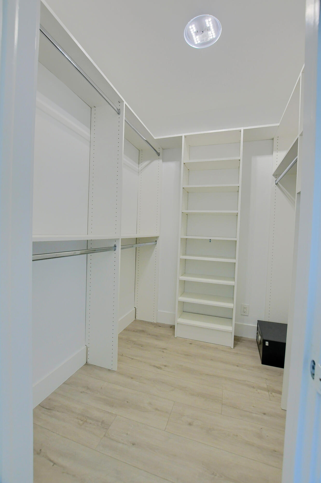 891 Hickory Terrace Boca Raton, FL 33486 - Photo 29 of 56 a view of an empty walk in closet