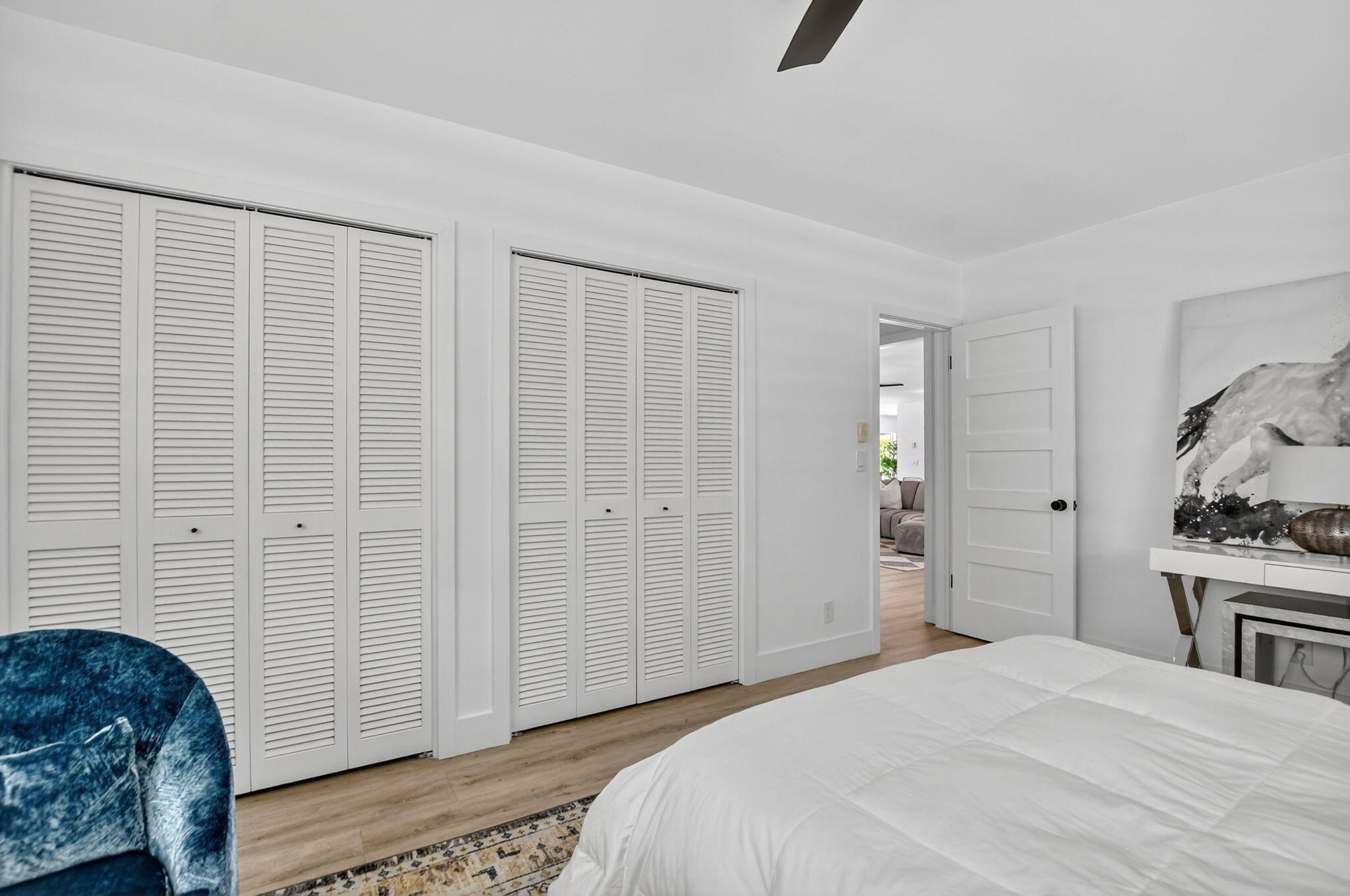 891 Hickory Terrace Boca Raton, FL 33486 - Photo 31 of 56 a bedroom with a bed and a dresser in it