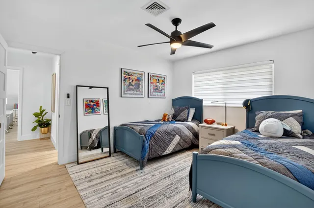 a view of a livingroom with wooden floor