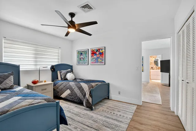 a utility room with refrigerator washer and dryer