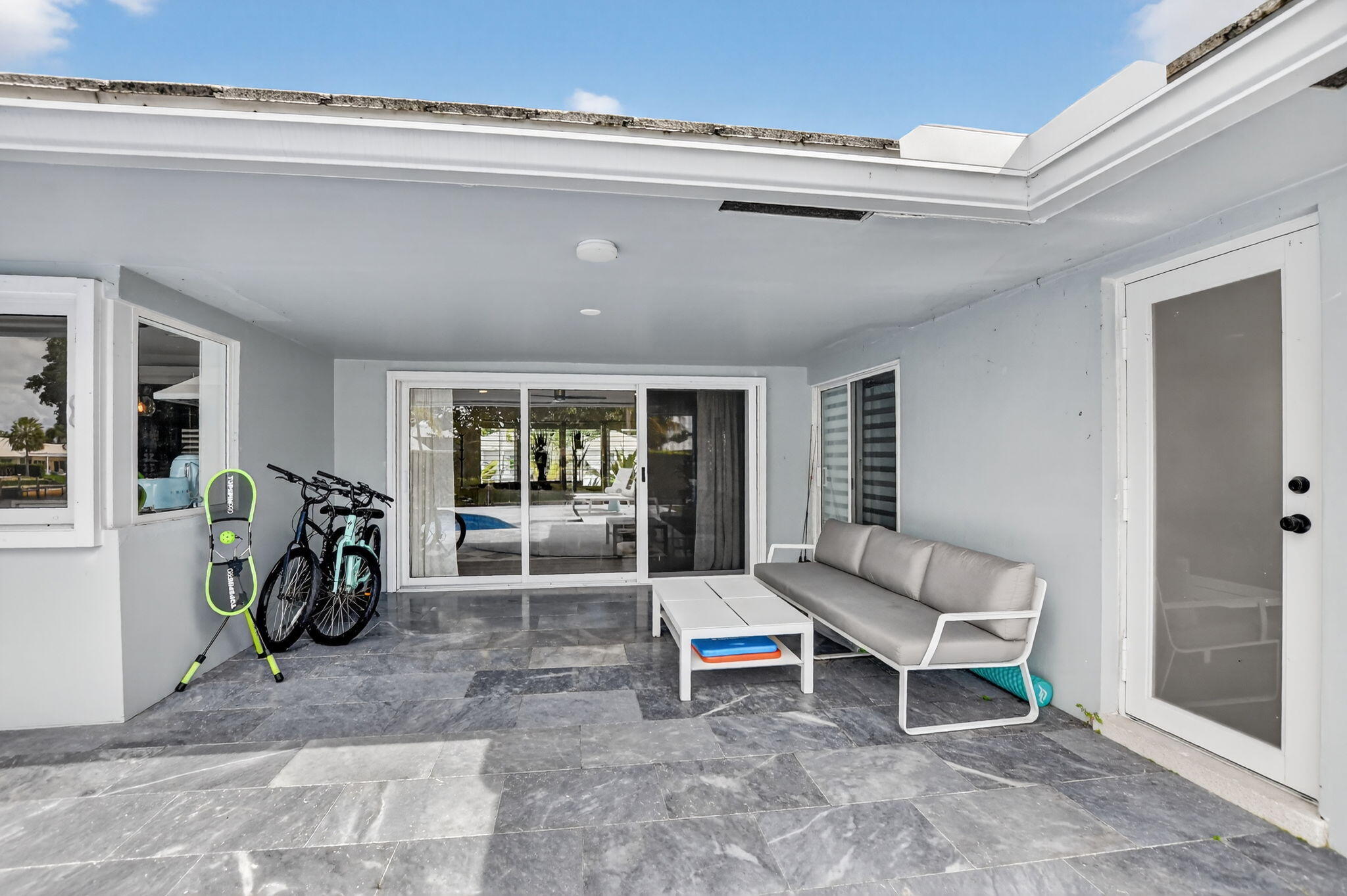 891 Hickory Terrace Boca Raton, FL 33486 - Photo 39 of 56 a living room with furniture and a window