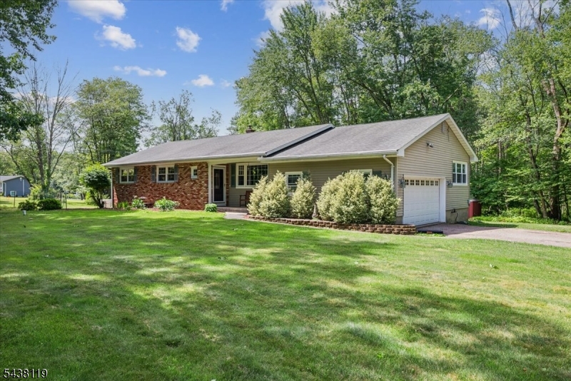 335 Drakestown Road Long Valley, NJ 07853 - Photo 1 of 34 a front view of a house with garden
