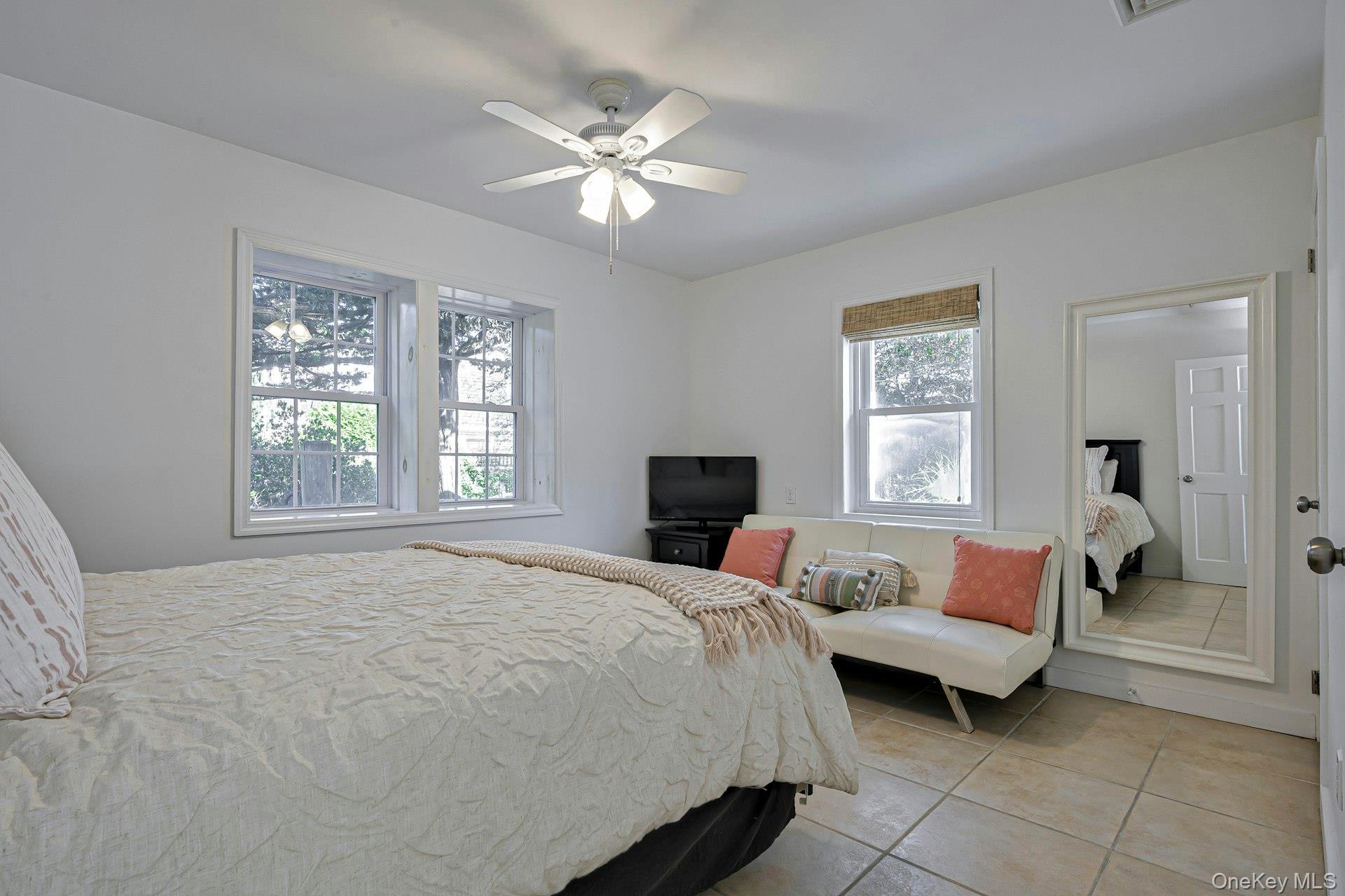 39 Sloop Walk Ocean Beach, NY 11770 - Photo 26 of 46 Bright interior featuring tiled flooring and white walls