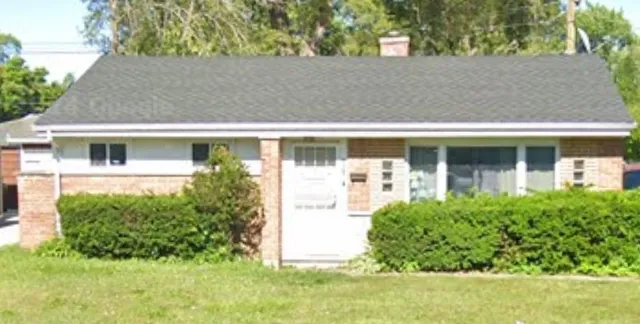 front view of house with a yard