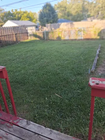 a view of a garden with a lake