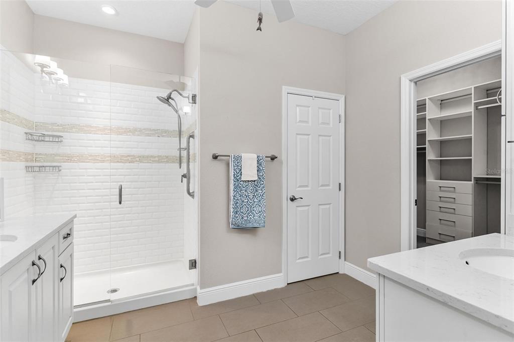224 Silver Maple Road Groveland, FL 34736 - Photo 28 of 54 a bathroom with a shower