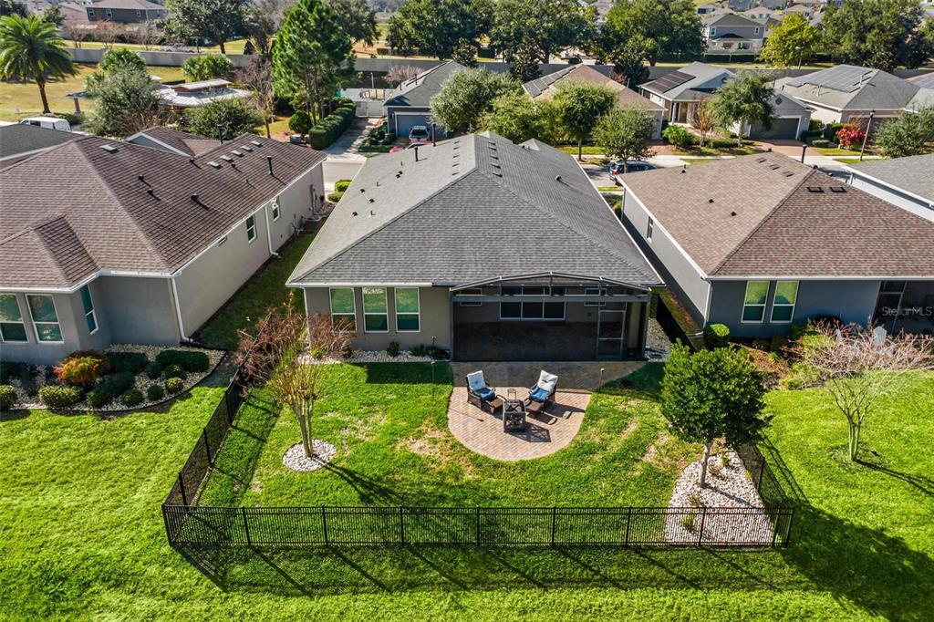 224 Silver Maple Road Groveland, FL 34736 - Photo 47 of 54 an aerial view of a house with a yard garden and patio