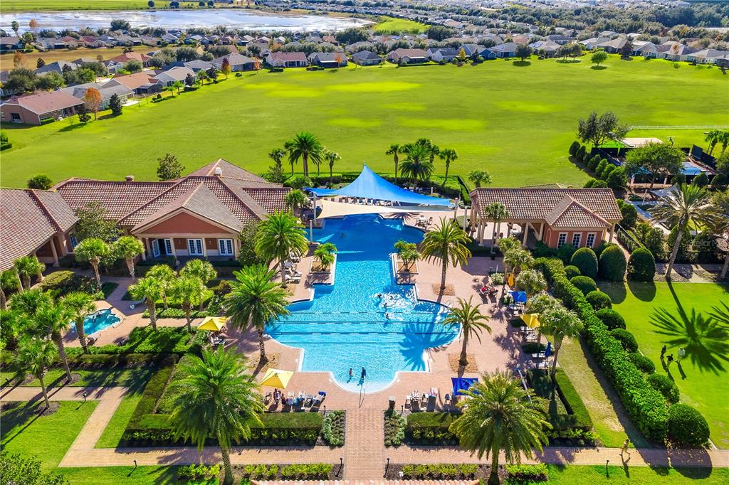 224 Silver Maple Road Groveland, FL 34736 - Photo 54 of 54 an aerial view of residential houses with outdoor space and lake view in back