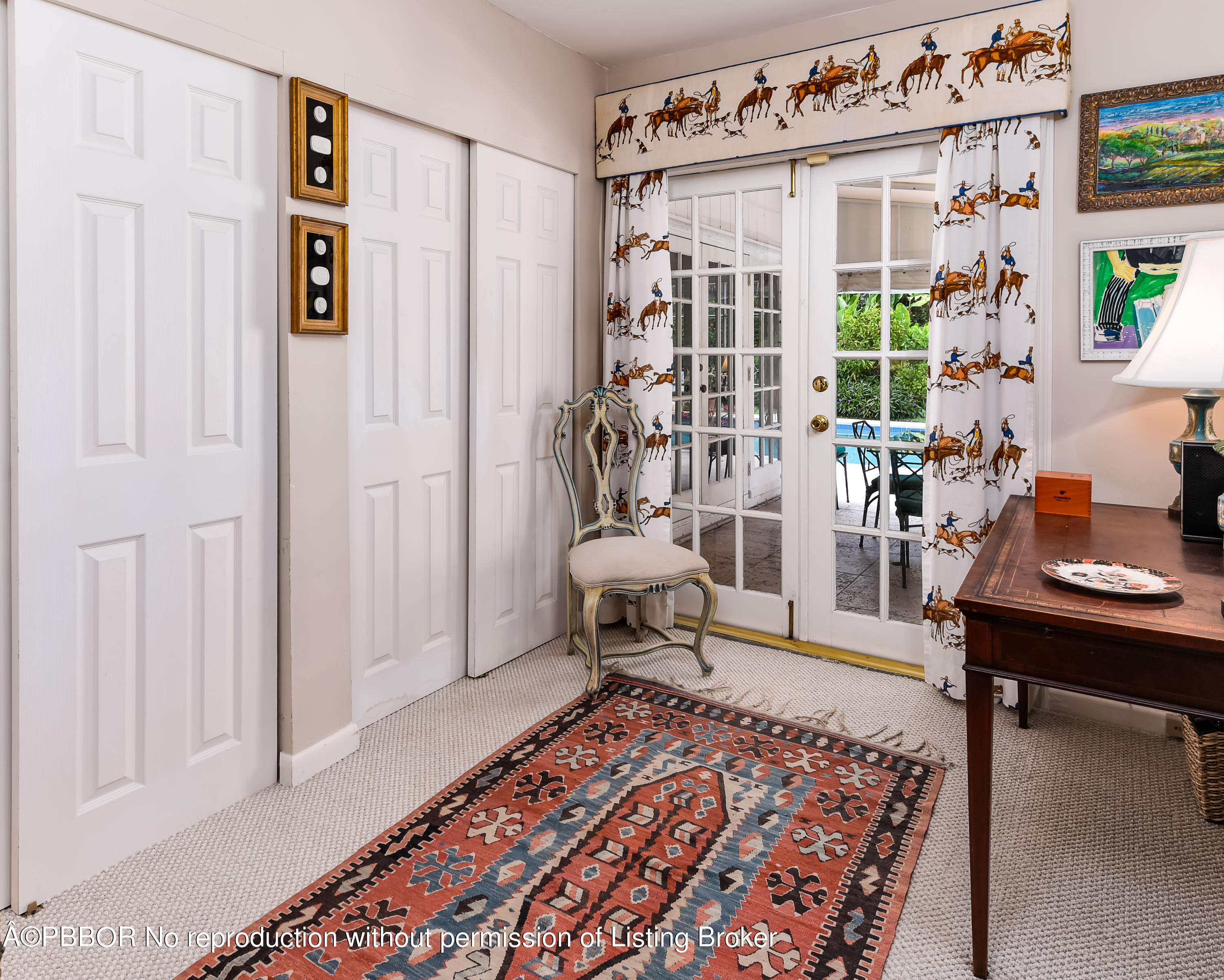 257 Fairview Road Palm Beach, FL 33480 - Photo 9 of 17 a living room with furniture and a table