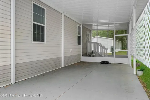 a view of a house with a gate