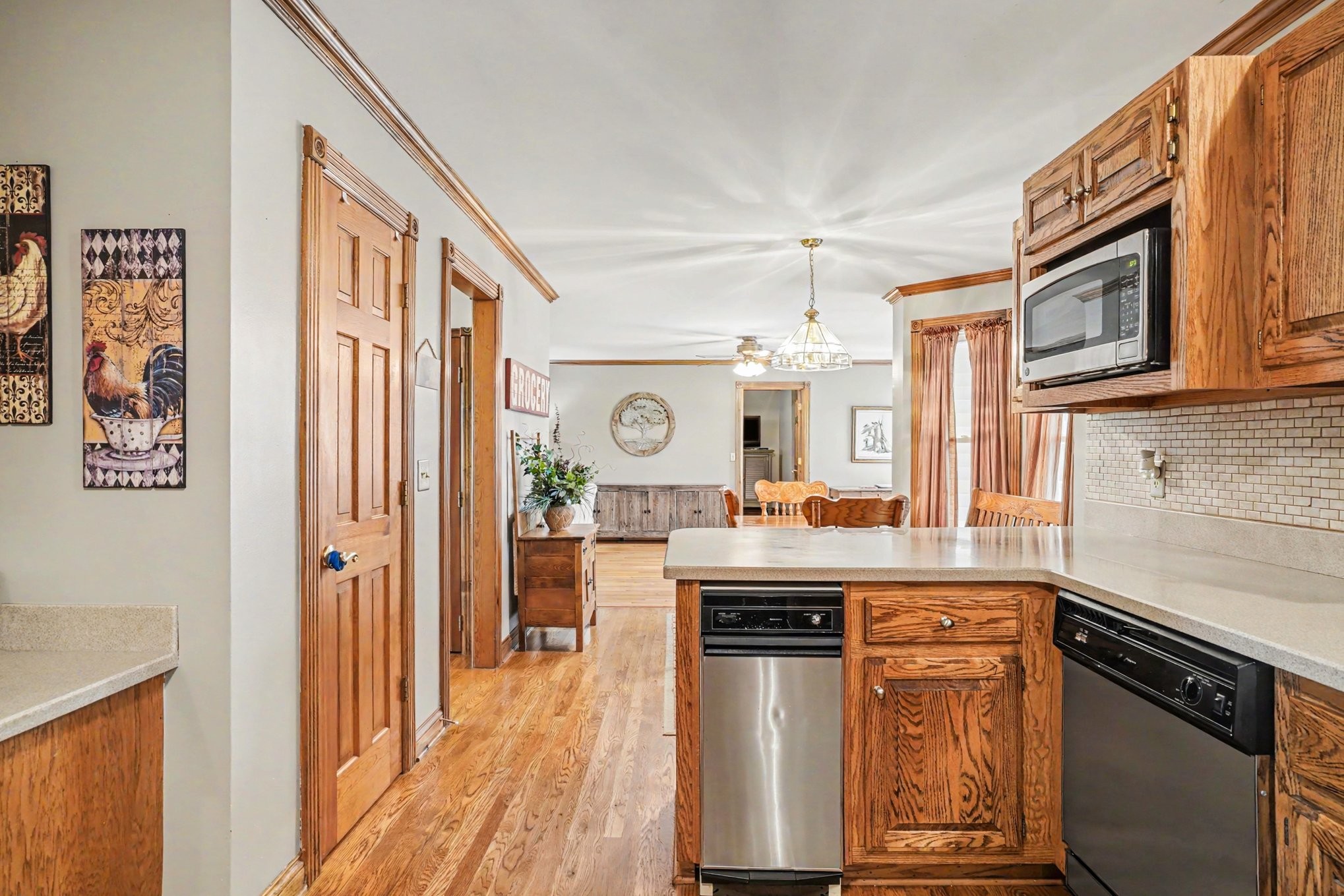 2075 Liebengood Road Goodlettsville, TN 37072 - Photo 13 of 40 a kitchen with stainless steel appliances granite countertop a stove and a refrigerator