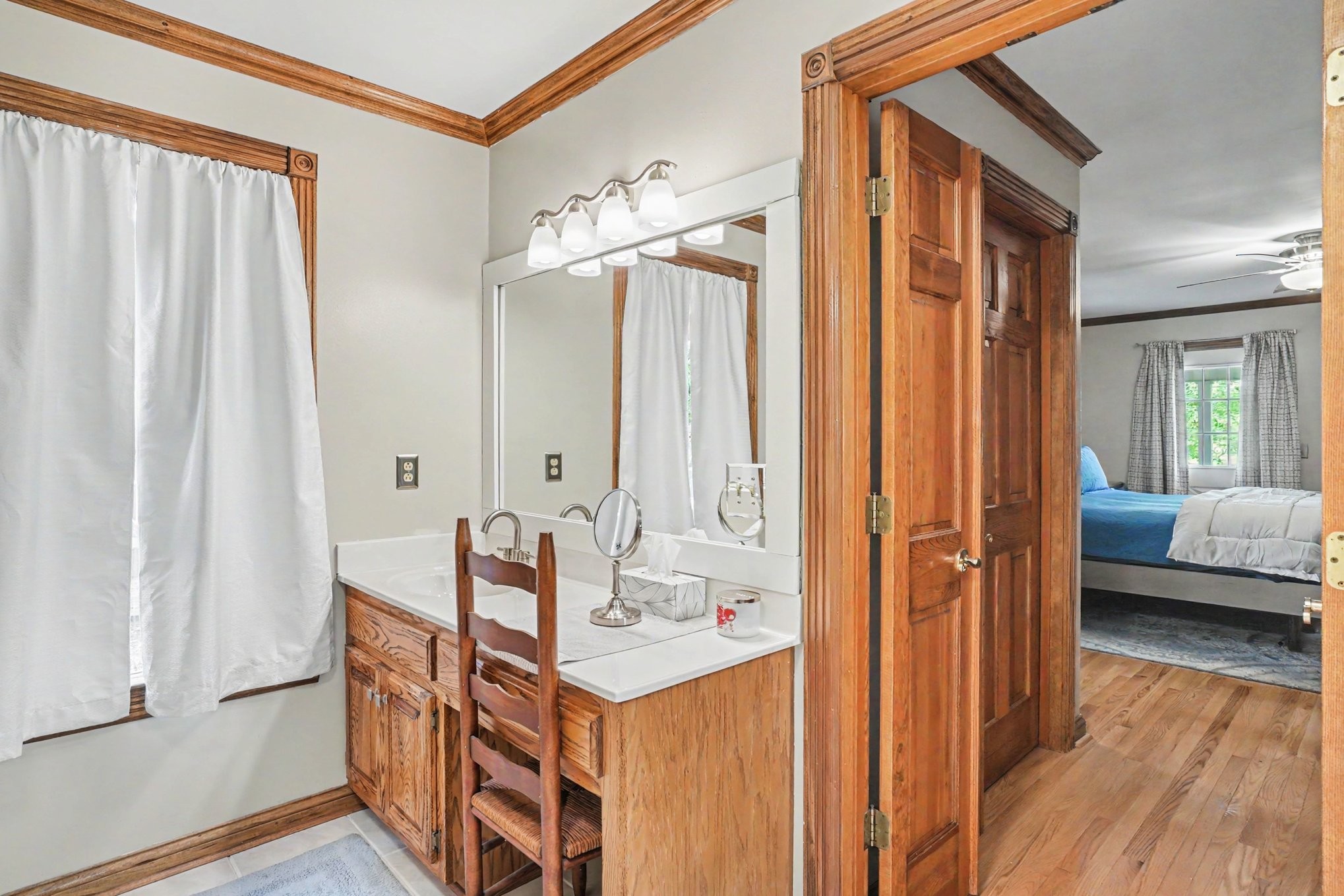 2075 Liebengood Road Goodlettsville, TN 37072 - Photo 17 of 40 a en suite bathroom with a sink a mirror and a shower