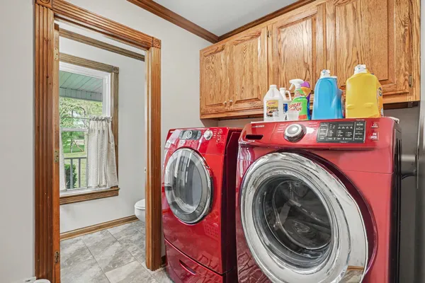 a utility room with dryer and washer