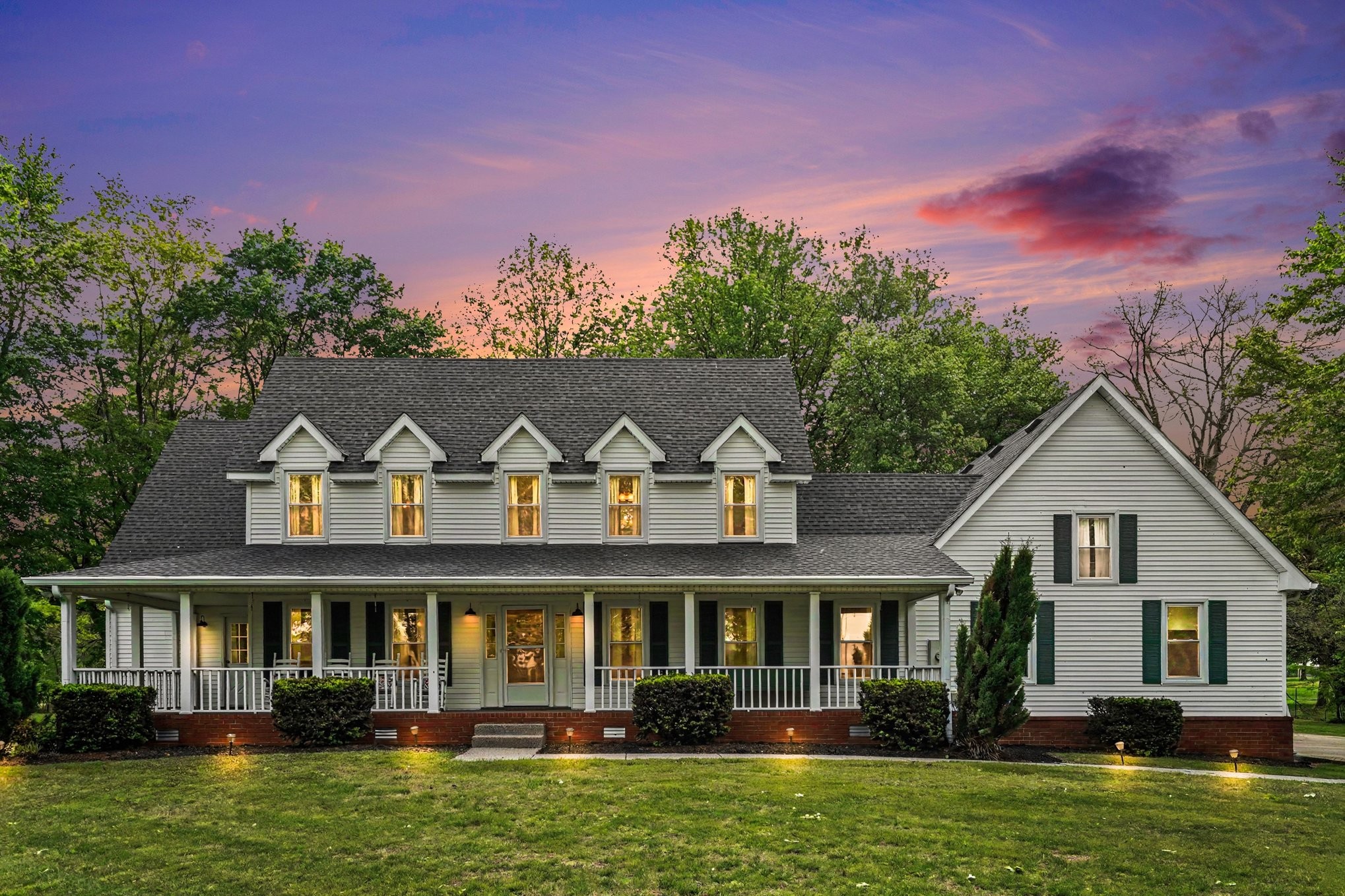 2075 Liebengood Road Goodlettsville, TN 37072 - Photo 2 of 40 a front view of a house with a yard table and chairs