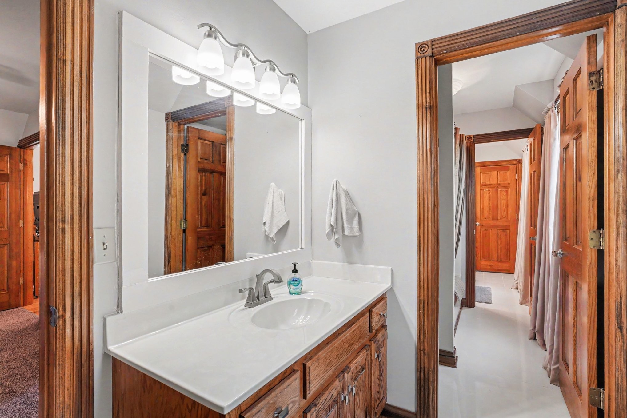 2075 Liebengood Road Goodlettsville, TN 37072 - Photo 24 of 40 a en suite bathroom with a sink and a mirror