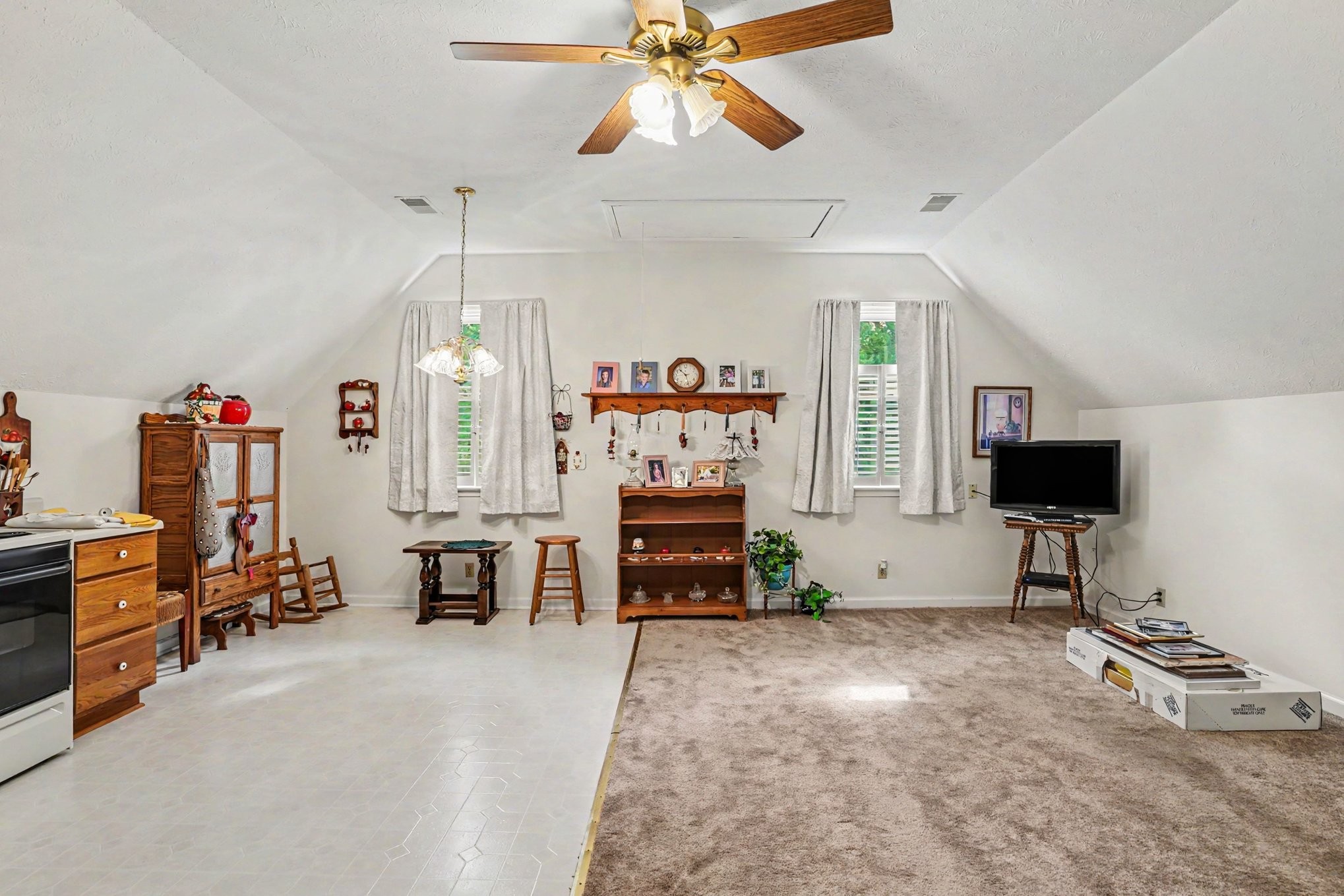2075 Liebengood Road Goodlettsville, TN 37072 - Photo 27 of 40 a view of a livingroom with furniture and a flat screen tv
