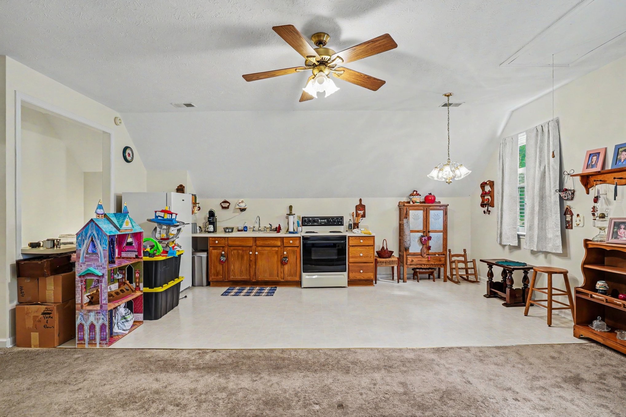 2075 Liebengood Road Goodlettsville, TN 37072 - Photo 28 of 40 a storage room with furniture and a ceiling fan