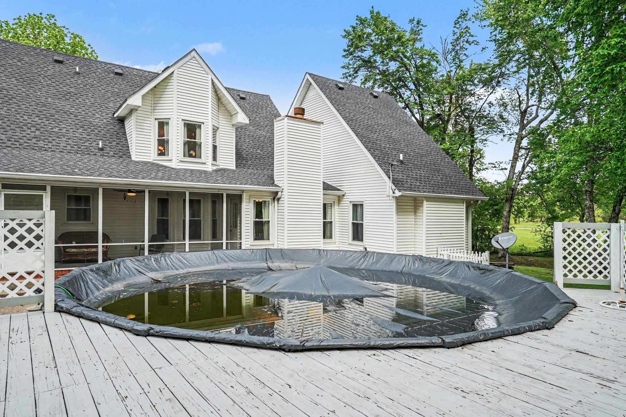 2075 Liebengood Road Goodlettsville, TN 37072 - Photo 34 of 40 a view of a house with a yard and potted plants