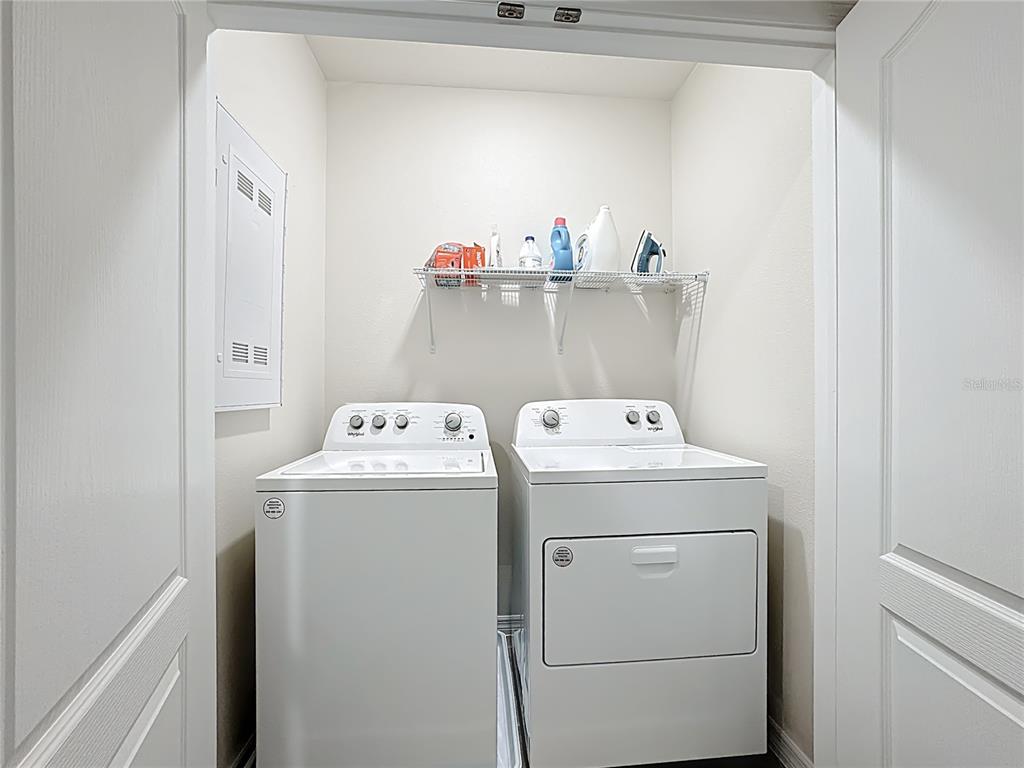 3140 Goose Road Davenport, FL 33837 - Photo 27 of 40 a utility room with dryer and washer