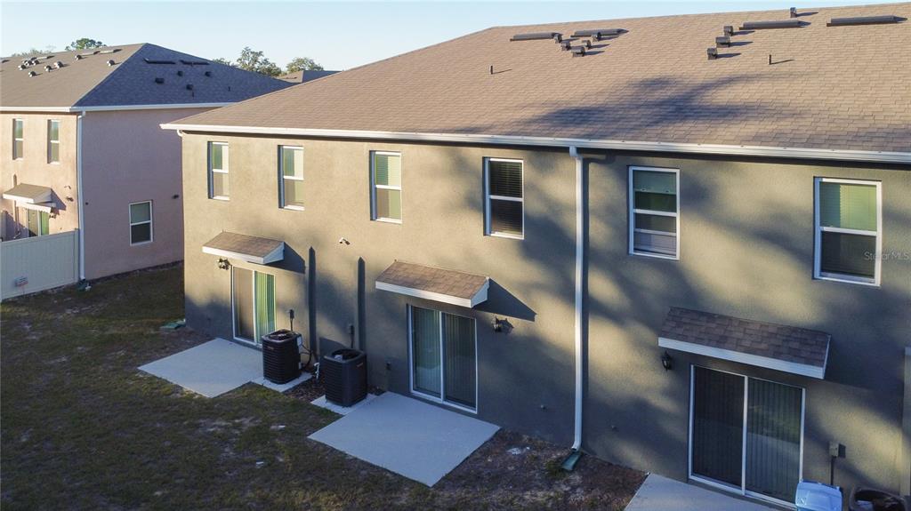 3140 Goose Road Davenport, FL 33837 - Photo 31 of 40 a front view of a house with a yard