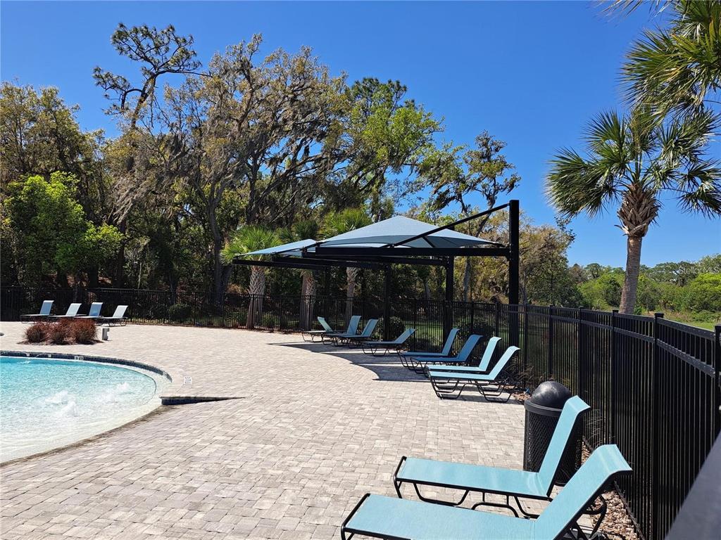 3140 Goose Road Davenport, FL 33837 - Photo 33 of 40 a view of outdoor space with seating area and trees