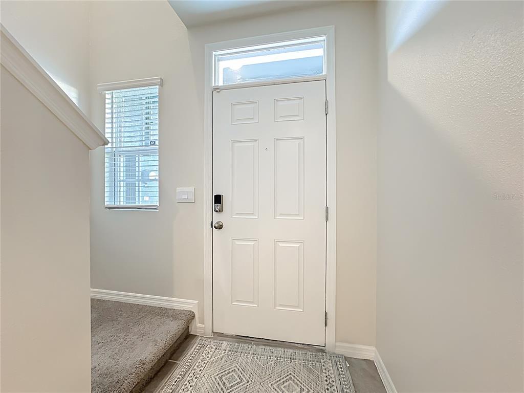 3140 Goose Road Davenport, FL 33837 - Photo 6 of 40 an empty room with windows and closet