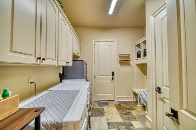 an aerial view of a house pool outdoor seating and yard