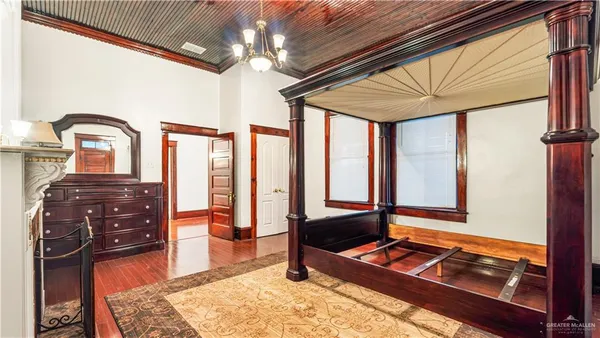 a view of front door with wooden floor