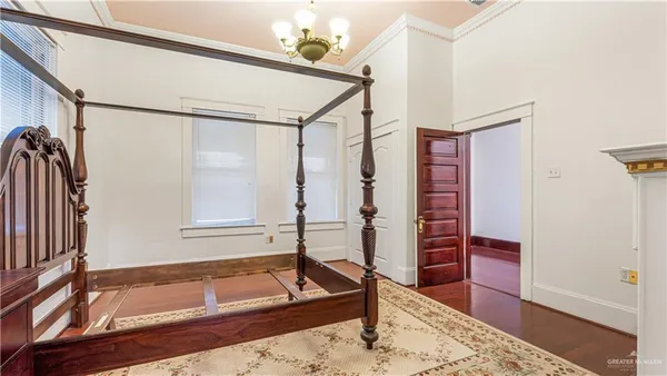 an empty room with windows closet and livingroom