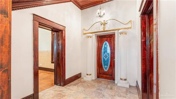 a view of front door with hallway
