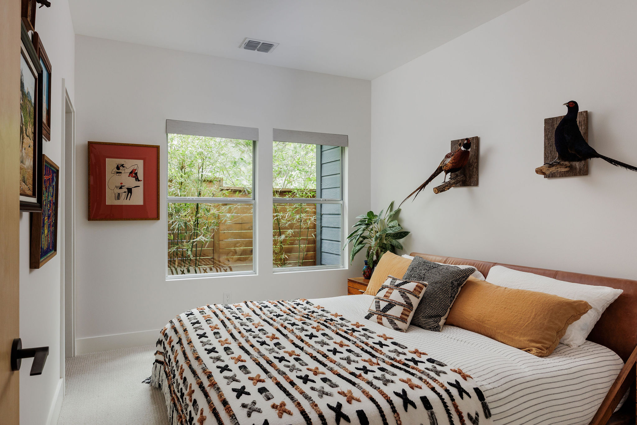 1605 Maple Avenue Austin, TX 78702 - Photo 17 of 33 Bedroom with light-toned walls