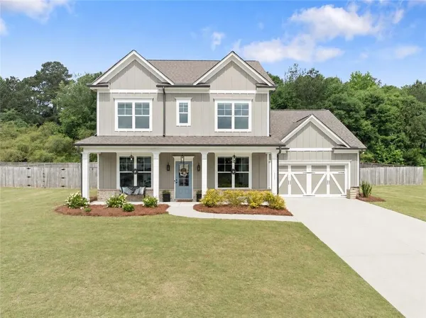 a front view of a house with an outdoor space