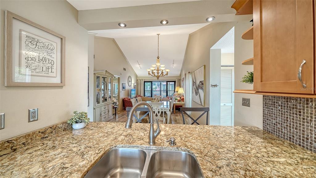 6204 Midnight Pass Road, Unit 205 Sarasota, FL 34242 - Photo 20 of 62 a view of a livingroom with furniture