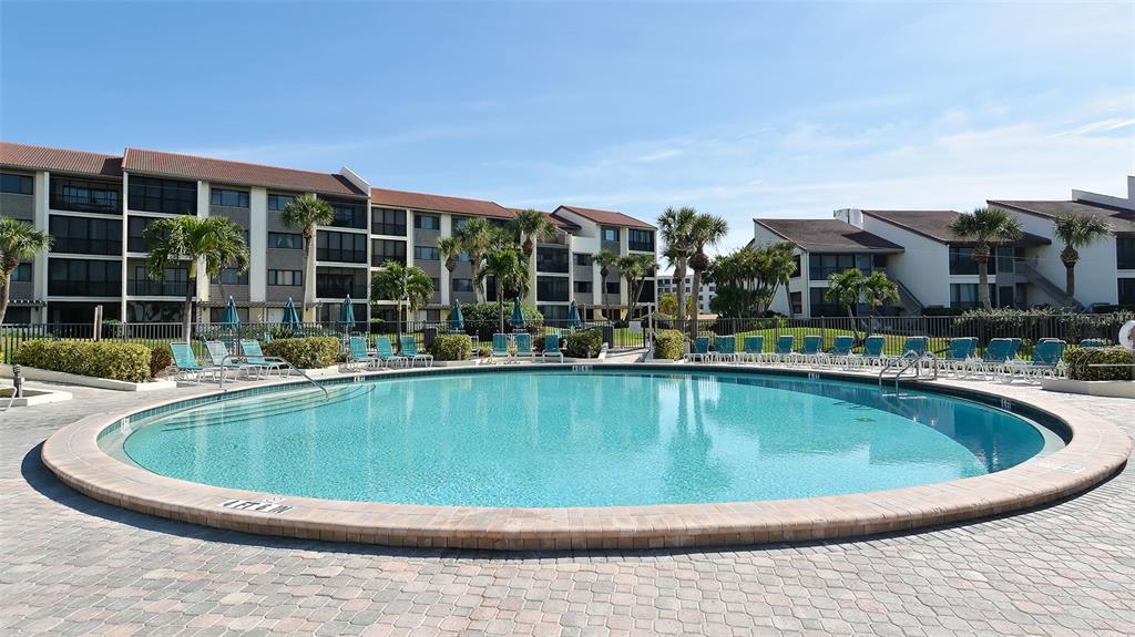 6204 Midnight Pass Road, Unit 205 Sarasota, FL 34242 - Photo 36 of 62 a view of outdoor space yard swimming pool and patio