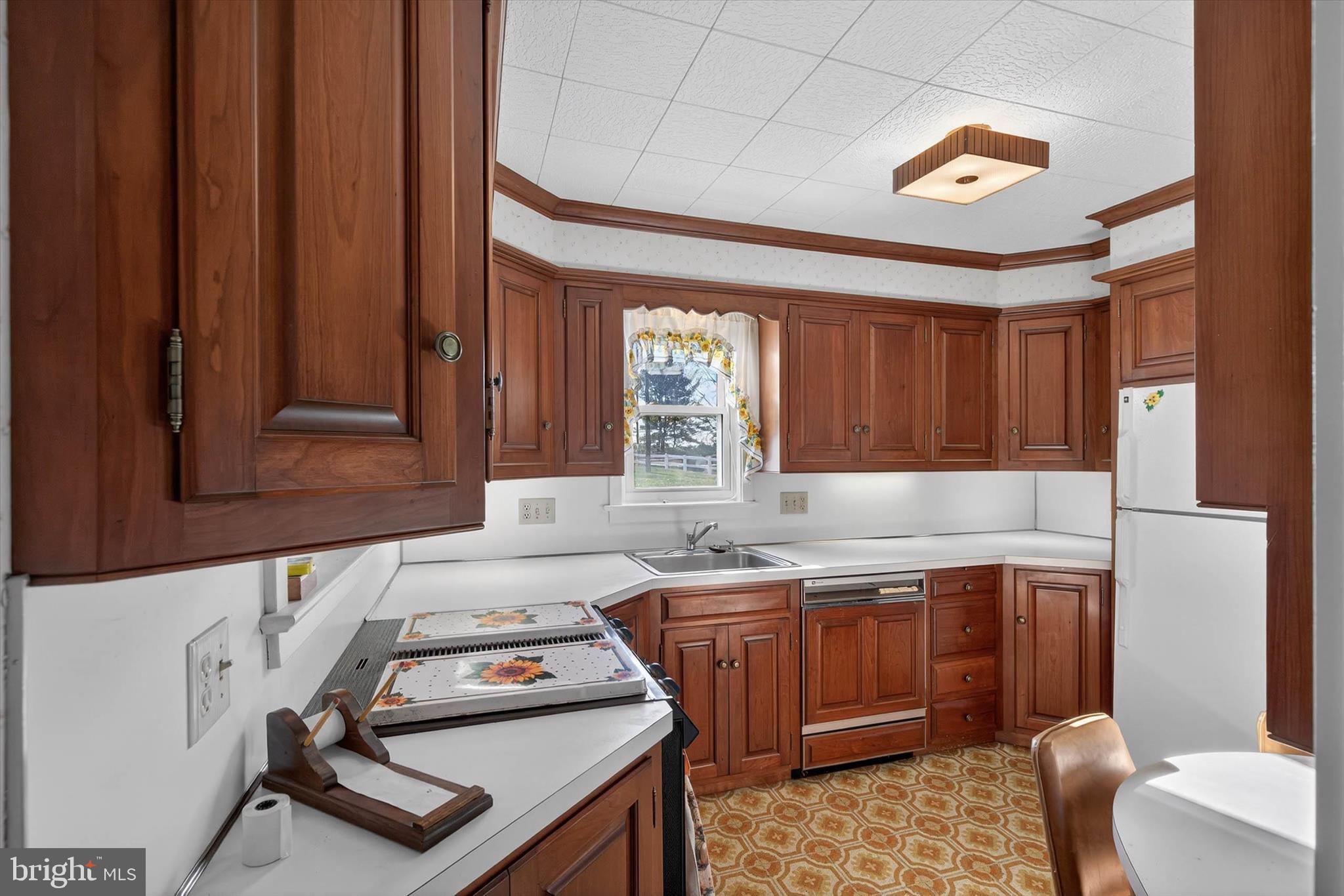 319 Druid Hill Road Mountville, PA 17554 - Photo 14 of 62 a kitchen that has a sink and a stove in it