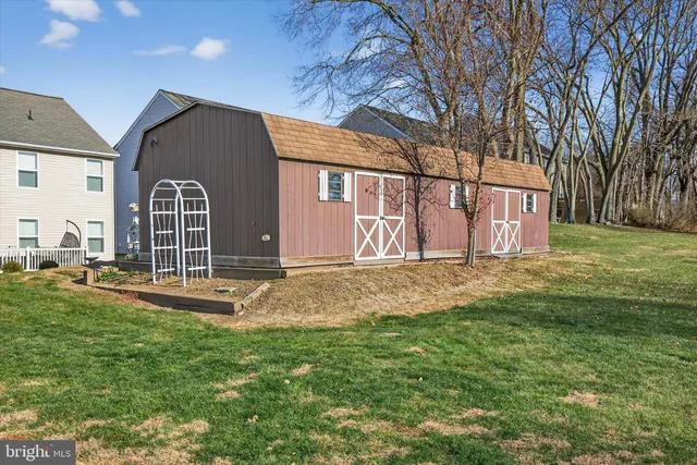 a view of a room with chairs and closet