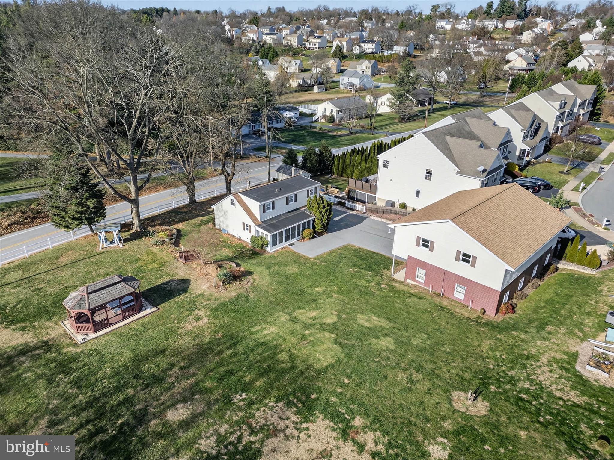 319 Druid Hill Road Mountville, PA 17554 - Photo 47 of 62 an aerial view of a house with garden space and street view