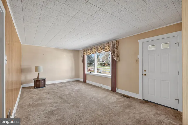 a view of empty room with a window