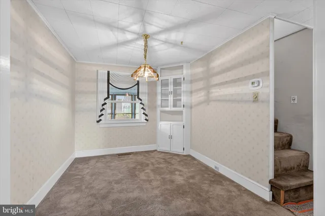 a kitchen with a sink and a window