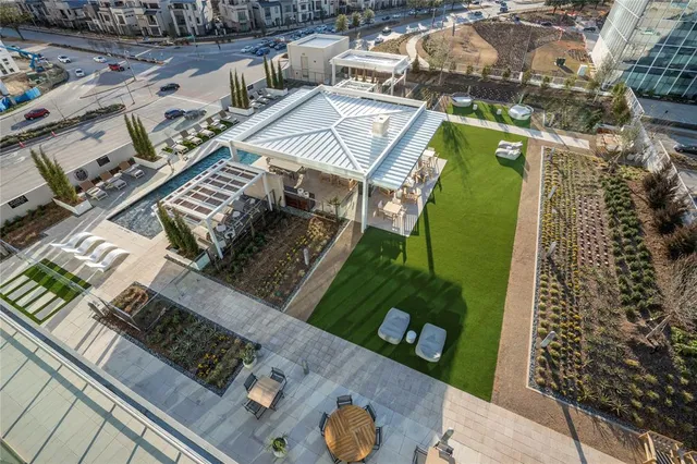 an aerial view of a house with outdoor space