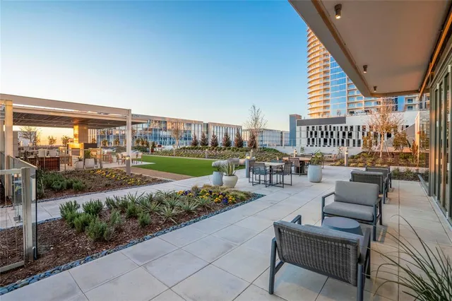 a outdoor space with lots of tables and chairs