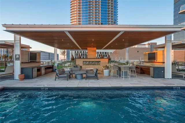 an outdoor space with patio lots of furniture